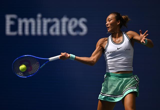 (260910) -- NEW YORK, Sept. 10, 2026 (Xinhua) -- Zheng Qinwen hits a return during the women's singles quarterfinal between Elena Rybakina of Kazakhstan and Zheng Qinwen of China at the 2026 US Open tennis championships in New York, the United States, Sept. 9, 2026. (Xinhua/Li Rui)