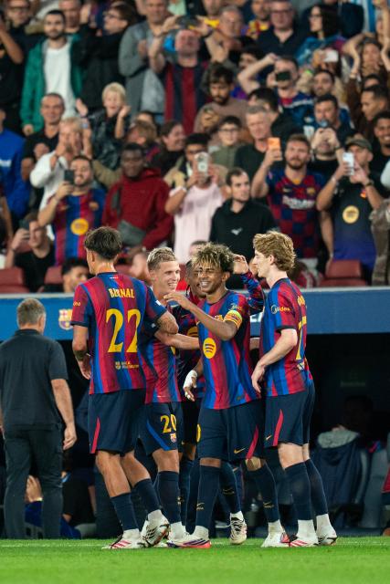 (260910) -- BARCELONA, Sept. 10, 2026 (Xinhua) -- FC Barcelona's players celebrate the goal of Lamine Yamal (2nd R) during the UEFA Champions League match between FC Barcelona and Feyenoord in Barcelona, Spain, on Sept. 9, 2026. (Photo by Joan Gosa/Xinhua)