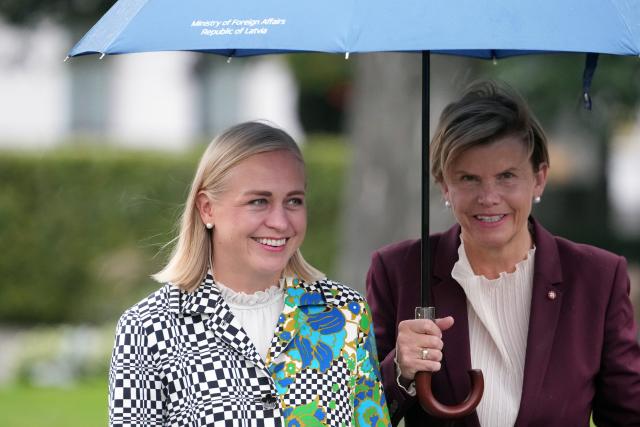 (260910) -- RIGA, Sept. 10, 2026 (Xinhua) -- Finnish Foreign Minister Elina Valtonen (L) and her Latvian counterpart Baiba Braze arrive to attend a wreath-laying ceremony at the Independence Stella monument in Riga, Latvia, Sept. 9, 2026. Latvia hosted a series of European foreign ministers on Wednesday, with NATO's eastern flank security, protection of the European Union's eastern border and continued support for Ukraine high on the agenda, according to the Latvian Foreign Ministry. (Photo by Edijs Palens/Xinhua)