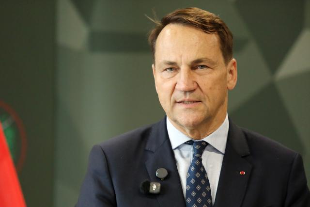 (260910) -- RIGA, Sept. 10, 2026 (Xinhua) -- Polish Foreign Minister Radoslaw Sikorski reacts during a press conference at the Adazi Military Base in Adazi, Latvia, Sept. 9, 2026. Latvia hosted a series of European foreign ministers on Wednesday, with NATO's eastern flank security, protection of the European Union's eastern border and continued support for Ukraine high on the agenda, according to the Latvian Foreign Ministry. (Photo by Edijs Palens/Xinhua)