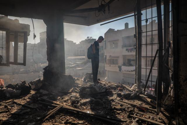 (260910) -- BEIJING, Sept. 10, 2026 (Xinhua) -- A Palestinian checks a destroyed residential apartment following an Israeli airstrike in Gaza City, Sept. 8, 2026. (Photo by Rizek Abdeljawad/Xinhua)