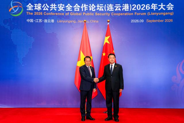 (260910) -- BEIJING, Sept. 10, 2026 (Xinhua) -- Chinese State Councilor and Minister of Public Security Wang Xiaohong meets with member of the Political Bureau of the Communist Party of Vietnam Central Committee and Vietnamese Minister of Public Security Luong Tam Quang in Lianyungang, east China's Jiangsu Province, Sept. 9, 2026. (Xinhua/Li Bo)