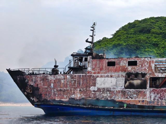 (260910) -- PALAWAN, Sept. 10, 2026 (Xinhua) -- The charred wreckage of a vessel is seen in the coast of Palawan Province, the Philippines, on Sept. 10, 2026. At least five were killed, and 87 remain missing after the vessel caught fire on Wednesday off the waters of a tourist hotspot in Palawan Province of the Philippines, said the local coast guard on Thursday. (The Philippine Coast Guard/Handout via Xinhua)