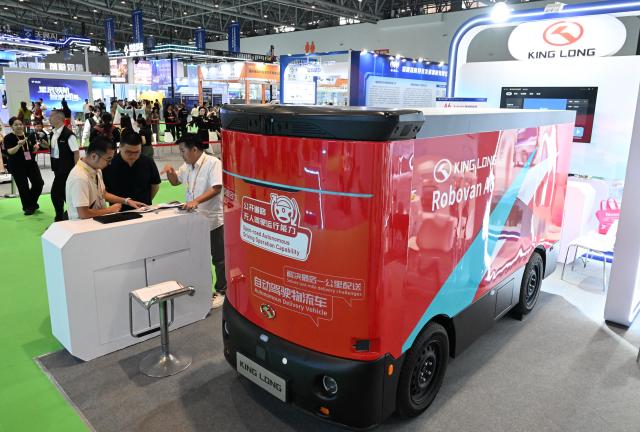 (260910) -- XIAMEN, Sept. 10, 2026 (Xinhua) -- A Robovan A6 autonomous logistics vehicle is displayed at the 26th China International Fair for Investment and Trade in Xiamen, southeast China's Fujian Province, Sept. 9, 2026. The 26th China International Fair for Investment and Trade opened Tuesday in Xiamen, drawing registrations from more than 1,200 government institutions and business delegations from 129 countries and regions, as well as 30 international organizations. Technological achievements in cutting-edge fields including artificial intelligence, low-altitude economy, new energy storage, and green power are showcased in this event. (Xinhua/Lin Shanchuan)