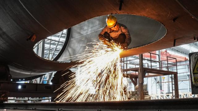(260910) -- NANNING, Sept. 10, 2026 (Xinhua) -- A staff member works at the workshop of a wind power equipment manufacturing enterprise at the China-Malaysia Qinzhou Industrial Park in Qinzhou City, south China's Guangxi Zhuang Autonomous Region, Sept. 4, 2026. Pinglu Canal in south China's Guangxi Zhuang Autonomous Region will become operational on Sept. 16. The 134.2-km canal links the Xijiang River shipping route in the north with the Beibu Gulf in the south. It is China's first major river-to-sea canal project that has been planned and coordinated at the national level since 1949.
   Centering the Pinglu Canal Economic Belt as its main artery, Guangxi focuses on large-capacity, port and waterway-related industries. It builds port-adjacent parks along the canal tailored to local conditions, forming industrial clusters that support upstream and downstream industries and foster collaboration among large, medium, and small enterprises.
   Across Guangxi, localities leverage their own resources to position themselves within a maritime-oriented industrial layout, advancing the high-quality development of the marine economy. (Xinhua/Zhang Ailin)