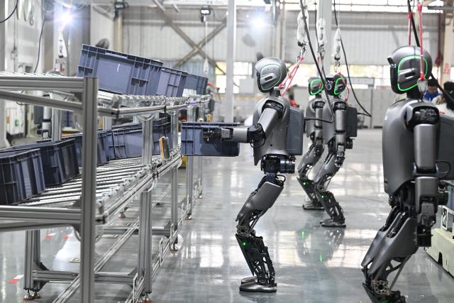 (260910) -- NANNING, Sept. 10, 2026 (Xinhua) -- Humanoid robots are seen under training at an intelligent manufacturing plant for commercial vehicles of the Dongfeng Liuzhou Motor in Liuzhou City, south China's Guangxi Zhuang Autonomous Region, Jan. 30, 2026. Pinglu Canal in south China's Guangxi Zhuang Autonomous Region will become operational on Sept. 16. The 134.2-km canal links the Xijiang River shipping route in the north with the Beibu Gulf in the south. It is China's first major river-to-sea canal project that has been planned and coordinated at the national level since 1949.
   Centering the Pinglu Canal Economic Belt as its main artery, Guangxi focuses on large-capacity, port and waterway-related industries. It builds port-adjacent parks along the canal tailored to local conditions, forming industrial clusters that support upstream and downstream industries and foster collaboration among large, medium, and small enterprises.
   Across Guangxi, localities leverage their own resources to position themselves within a maritime-oriented industrial layout, advancing the high-quality development of the marine economy. (Photo by Zheng Changhao/Xinhua)