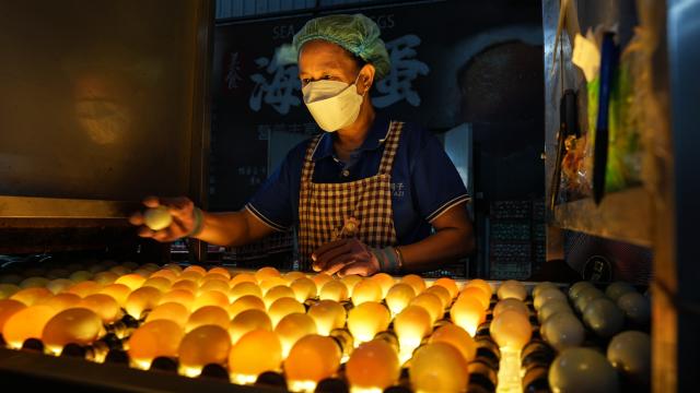 (260910) -- NANNING, Sept. 10, 2026 (Xinhua) -- A worker sorts out duck eggs at the workshop of an agricultural product processing enterprise in Qinzhou City, south China's Guangxi Zhuang Autonomous Region, Sept. 3, 2026. Pinglu Canal in south China's Guangxi Zhuang Autonomous Region will become operational on Sept. 16. The 134.2-km canal links the Xijiang River shipping route in the north with the Beibu Gulf in the south. It is China's first major river-to-sea canal project that has been planned and coordinated at the national level since 1949.
   Centering the Pinglu Canal Economic Belt as its main artery, Guangxi focuses on large-capacity, port and waterway-related industries. It builds port-adjacent parks along the canal tailored to local conditions, forming industrial clusters that support upstream and downstream industries and foster collaboration among large, medium, and small enterprises.
   Across Guangxi, localities leverage their own resources to position themselves within a maritime-oriented industrial layout, advancing the high-quality development of the marine economy. (Xinhua/Zhang Ailin)