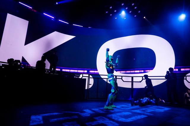 (260910) -- RIYADH, Sept. 10, 2026 (Xinhua) -- A humanoid robot raises its arms as its opponent lies on the floor during the CyberHero x Riyadh, a humanoid robot combat event, in Riyadh, Saudi Arabia, Sept. 9, 2026. (Hero Esports/Handout via Xinhua)