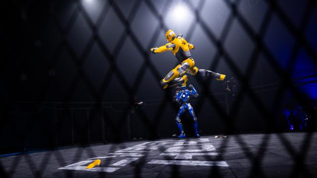 (260910) -- RIYADH, Sept. 10, 2026 (Xinhua) -- A yellow humanoid robot launches an airborne attack against its blue opponent during the CyberHero x Riyadh, a humanoid robot combat event, in Riyadh, Saudi Arabia, Sept. 9, 2026. (Hero Esports/Handout via Xinhua)