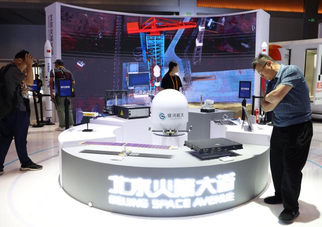 (260910) -- BEIJING, Sept. 10, 2026 (Xinhua) -- Visitors are seen at the booth of Beijing Space Avenue during the 2026 China International Fair for Trade in Services (CIFTIS) at Shougang Park in Beijing, capital of China, Sept. 10, 2026. Themed exhibition halls are showcasing new technologies, emerging business models and innovative applications at the ongoing 2026 CIFTIS, giving visitors a firsthand look at cutting-edge innovations in trade and services. (Xinhua/Zhang Chenlin)