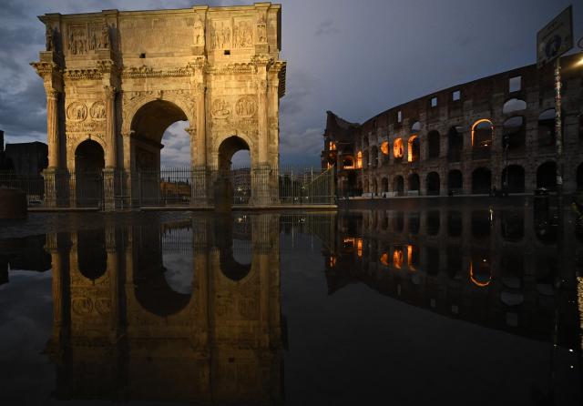 (260910) -- ROME, Sept. 10, 2026 (Xinhua) -- Photo taken on Sept. 10, 2026 shows the Arch of Constantine and the Colosseum after heavy rain in Rome, Italy. (Photo by Alberto Lingria/Xinhua)