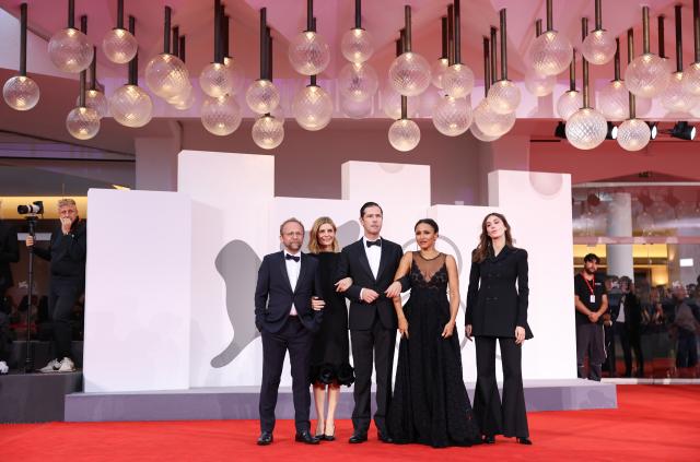 (260910) -- VENICE, Sept. 10, 2026 (Xinhua) -- Main crew of the film "One Minute To Midnight" pose at the red carpet before the premiere of the film during the 83rd Venice International Film Festival in Venice, Italy, Sept. 10, 2026. (Xinhua/Wang Kaiyan)