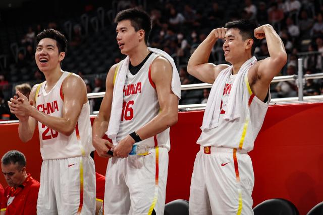 (260911) -- NAGOYA, Sept. 11, 2026 (Xinhua) -- (From L to R) Zhu Junlong, Jiao Boqiao and Cui Yongxi of China celebrates during the men's basketball group C match between China and Kazakhstan at the 20th Asian Games in Nagoya, Japan, Sept. 11, 2026. (Xinhua/Jia Haocheng)