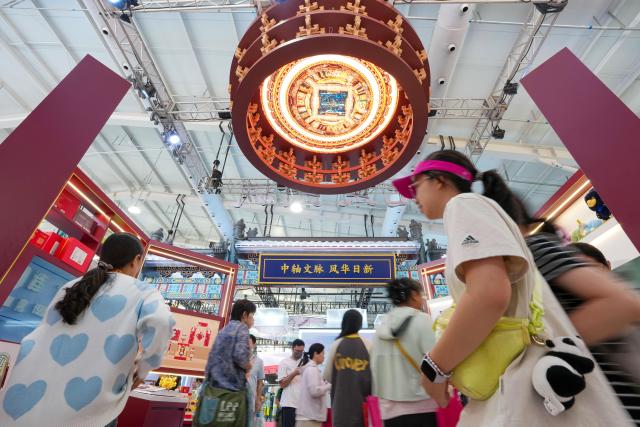(260912) -- BEIJING, Sept. 12, 2026 (Xinhua) -- People visit the themed exhibition area for culture and tourism services during the 2026 China International Fair for Trade in Services (CIFTIS) at Shougang Park in Beijing, capital of China, Sept. 12, 2026. The 2026 CIFTIS, running from Sept. 9 to 13 at Shougang Park in Beijing, has brought together 413 exhibitors at the themed exhibition area for culture and tourism services, showcasing emerging models of cultural and tourism integration. (Xinhua/Ju Huanzong)