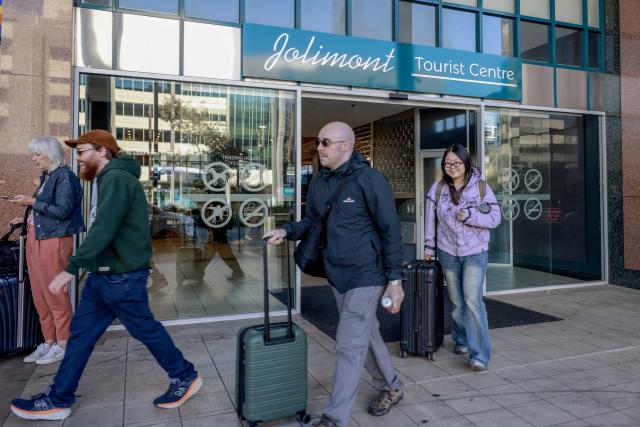 (260912) -- CANBERRA, Sept. 12, 2026 (Xinhua) -- People walk out of a tourist centre in Canberra, Australia, on Sept. 12, 2026. Australia recorded 710,980 short-term visitor arrivals in July 2026, down 4.3 percent from the same month a year earlier, official data showed on Friday. (Photo by Chu Chen/Xinhua)