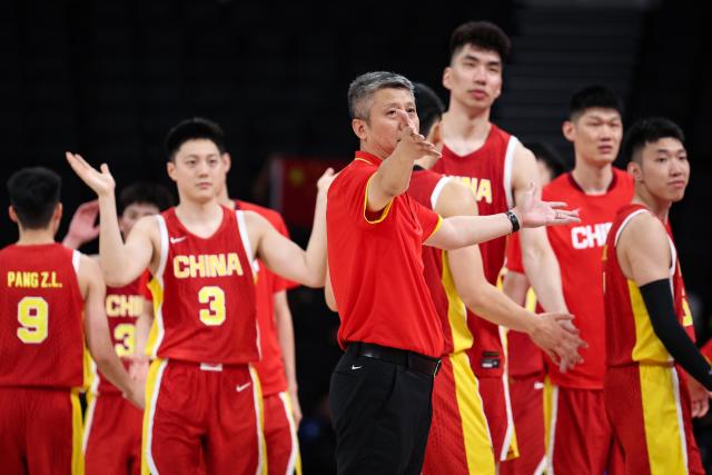 (260912) -- NAGOYA, Sept. 12, 2026 (Xinhua) -- Guo Shiqiang, headcoach of China, reacts after the group C match between China and Bahrain at 20th Asian Games Aichi-Nagoya 2026 in Nagoya, Japan, Sept. 12, 2026. (Xinhua/Jia Haocheng)