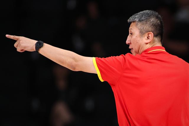 (260912) -- NAGOYA, Sept. 12, 2026 (Xinhua) -- Guo Shiqiang, headcoach of China, gestures during the group C match between China and Bahrain at 20th Asian Games Aichi-Nagoya 2026 in Nagoya, Japan, Sept. 12, 2026. (Xinhua/Jia Haocheng)