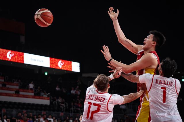 (260912) -- NAGOYA, Sept. 12, 2026 (Xinhua) -- Jiao Boqiao (top) of China competes during the group C match between China and Bahrain at 20th Asian Games Aichi-Nagoya 2026 in Nagoya, Japan, Sept. 12, 2026. (Xinhua/Jia Haocheng)