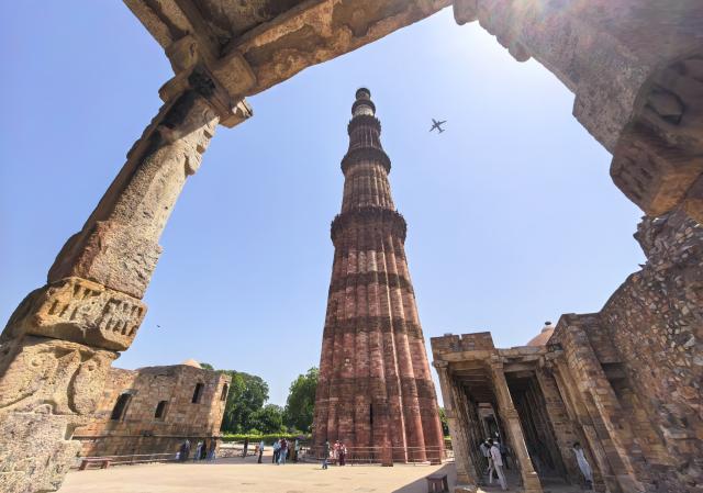 (260912) -- NEW DELHI, Sept. 12, 2026 (Xinhua) -- This photo taken with a mobile phone shows people visiting Qutb Minar in New Delhi, India, Sept. 9, 2026. The Qutb Minar, or Qutab Minar, was originally built in the 12th century and was inscribed on the World Heritage List by the United Nations Educational, Scientific and Cultural Organization (UNESCO) in 1993. India is a country with a long-standing civilization. Its capital, New Delhi, located on the banks of the Yamuna River, serves as the country's political and cultural center. (Xinhua/Yan Yan)