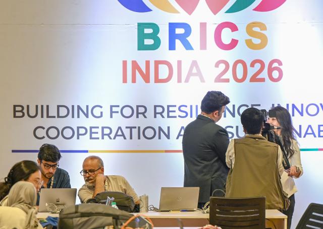 (260912) -- NEW DELHI, Sept. 12, 2026 (Xinhua) -- Media staff work at the media center at Bharat Mandapam, the main venue of the 18th BRICS Summit in New Delhi, India, Sept. 12, 2026. (Xinhua/Javed Dar)