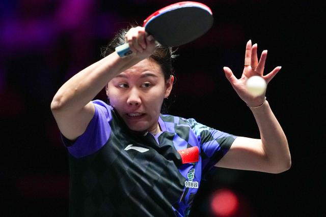 (260912) -- MACAO, Sept. 12, 2026 (Xinhua) -- Chen Xingtong hits a return during the women's singles quarterfinal match between Chen Xingtong of China and Dina Meshref of Egypt at the 2026 World Table Tennis (WTT) Champions Macao in Macao, south China, Sept. 12, 2026. (Xinhua/Cheong Kam Ka)
