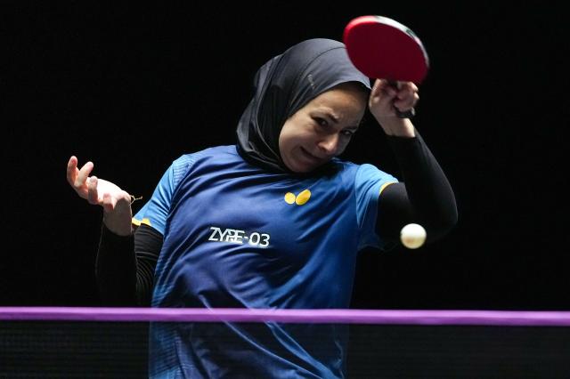 (260912) -- MACAO, Sept. 12, 2026 (Xinhua) -- Dina Meshref hits a return during the women's singles quarterfinal match between Chen Xingtong of China and Dina Meshref of Egypt at the 2026 World Table Tennis (WTT) Champions Macao in Macao, south China, Sept. 12, 2026. (Xinhua/Cheong Kam Ka)