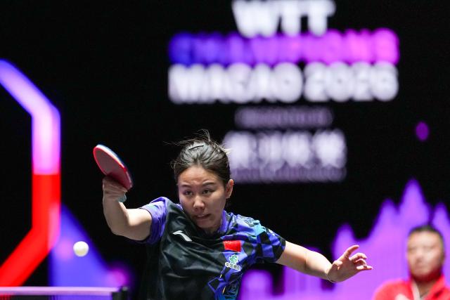 (260912) -- MACAO, Sept. 12, 2026 (Xinhua) -- Chen Xingtong hits a return during the women's singles quarterfinal match between Chen Xingtong of China and Dina Meshref of Egypt at the 2026 World Table Tennis (WTT) Champions Macao in Macao, south China, Sept. 12, 2026. (Xinhua/Cheong Kam Ka)
