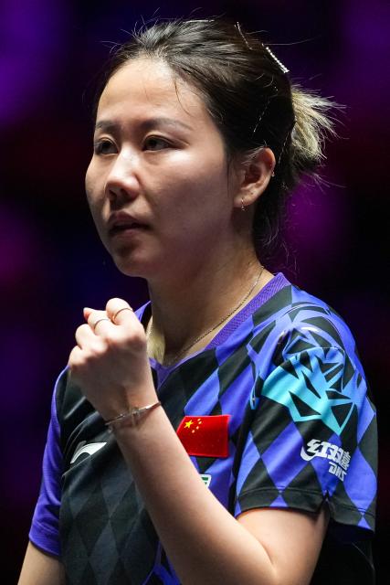 (260912) -- MACAO, Sept. 12, 2026 (Xinhua) -- Chen Xingtong celebrates after the women's singles quarterfinal match between Chen Xingtong of China and Dina Meshref of Egypt at the 2026 World Table Tennis (WTT) Champions Macao in Macao, south China, Sept. 12, 2026. (Xinhua/Cheong Kam Ka)
