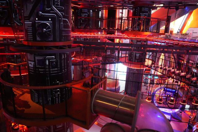 (260912) -- BEIJING, Sept. 12, 2026 (Xinhua) -- This photo taken on June 20, 2025 shows an interior view of the SoReal sci-fi Park transformed from No. 1 blast furnace of Shougang Park, in Beijing, capital of China.
  Beijing's Shougang Park saw its last blast furnace shut down in 2010, marking the end of more than a century of steelmaking. After more than a decade of transformation, the former industrial site now blends preserved steel structures with modern architecture and green spaces.
  The park hosted the Big Air Shougang, a landmark venue of the Beijing 2022 Winter Olympics, and has since evolved into a hub for exhibitions, commerce, sports and cultural tourism. It is now the permanent venue of the China International Fair for Trade in Services and has also attracted businesses in emerging fields such as science fiction and technology.
  From an old industrial site to a vibrant urban destination, Shougang Park offers a vivid example of how China is transforming its traditional industrial bases. (Xinhua/Zheng Huansong)