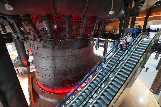 (260912) -- BEIJING, Sept. 12, 2026 (Xinhua) -- People visit the Shougang Park, a venue of the 2024 China International Fair for Trade in Services, in Beijing, capital of China, Sept. 13, 2024.
  Beijing's Shougang Park saw its last blast furnace shut down in 2010, marking the end of more than a century of steelmaking. After more than a decade of transformation, the former industrial site now blends preserved steel structures with modern architecture and green spaces.
  The park hosted the Big Air Shougang, a landmark venue of the Beijing 2022 Winter Olympics, and has since evolved into a hub for exhibitions, commerce, sports and cultural tourism. It is now the permanent venue of the China International Fair for Trade in Services and has also attracted businesses in emerging fields such as science fiction and technology.
  From an old industrial site to a vibrant urban destination, Shougang Park offers a vivid example of how China is transforming its traditional industrial bases. (Xinhua/Chen Yehua)