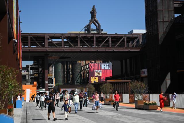 (260912) -- BEIJING, Sept. 12, 2026 (Xinhua) -- People visit the 2026 China International Fair for Trade in Services at Shougang Park in Beijing, capital of China, Sept. 12, 2026.
  Beijing's Shougang Park saw its last blast furnace shut down in 2010, marking the end of more than a century of steelmaking. After more than a decade of transformation, the former industrial site now blends preserved steel structures with modern architecture and green spaces.
  The park hosted the Big Air Shougang, a landmark venue of the Beijing 2022 Winter Olympics, and has since evolved into a hub for exhibitions, commerce, sports and cultural tourism. It is now the permanent venue of the China International Fair for Trade in Services and has also attracted businesses in emerging fields such as science fiction and technology.
  From an old industrial site to a vibrant urban destination, Shougang Park offers a vivid example of how China is transforming its traditional industrial bases. (Xinhua/Zheng Huansong)
