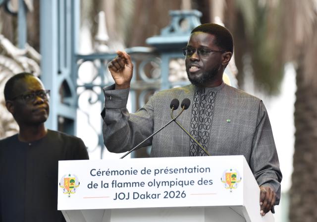 (260912) -- DAKAR, Sept. 12, 2026 (Xinhua) -- Senegalese President Bassirou Diomaye Faye delivers a speech during a ceremony to welcome the Youth Olympic flame for the Dakar 2026 Youth Olympic Games outside the Presidential Palace in Dakar, Senegal, Sept. 12, 2026. (Photo by Papa Demba Gueye/Xinhua)
