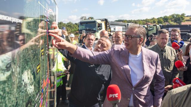 (260912) -- MLADENOVAC, Sept. 12, 2026 (Xinhua) -- Serbian President Aleksandar Vucic looks at a route map during his visit to the construction site of the Chinese-built Vozd Karadjordje expressway near Mladenovac, Serbia, Sept. 12, 2026. Serbian President Aleksandar Vucic on Saturday inspected construction works of the Vozd Karadjordje expressway which is being constructed by a Chinese company, highlighting its strategic importance for central Serbia. (Photo by Wang Wei/Xinhua)