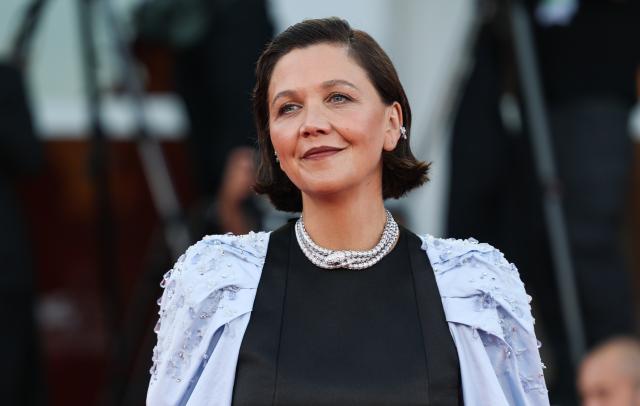 (260912) -- VENICE, Sept. 12, 2026 (Xinhua) -- U.S. actress and director Maggie Gyllenhaal, president of the 83rd Venice Film Festival Jury, poses at the red carpet of the 83rd Venice International Film Festival closing ceremony in Venice, Italy, Sept. 12, 2026. (Xinhua/Wang Kaiyan)