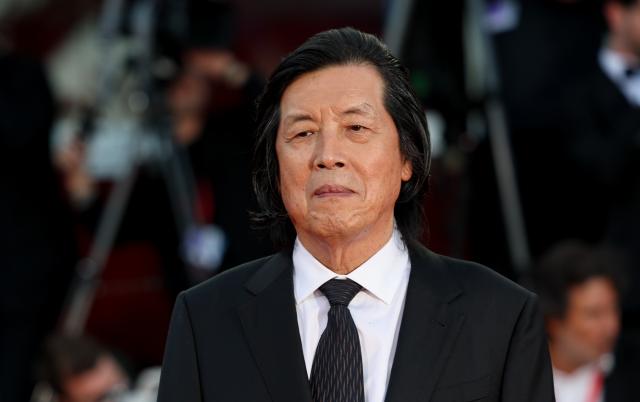 (260912) -- VENICE, Sept. 12, 2026 (Xinhua) -- South Korean director Lee Chang-dong poses at the red carpet of the 83rd Venice International Film Festival closing ceremony in Venice, Italy, Sept. 12, 2026. (Xinhua/Wang Kaiyan)