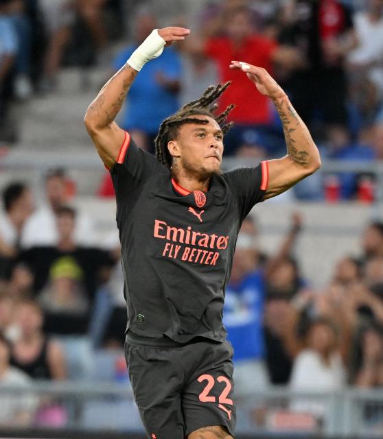(260913) -- ROME, Sept. 13, 2026 (Xinhua) -- AC Milan's Diego Moreira celebrates his goal during a Serie A football match between Lazio and AC Milan in Rome, Italy, Sept. 12, 2026. (Photo by Alberto Lingria/Xinhua)