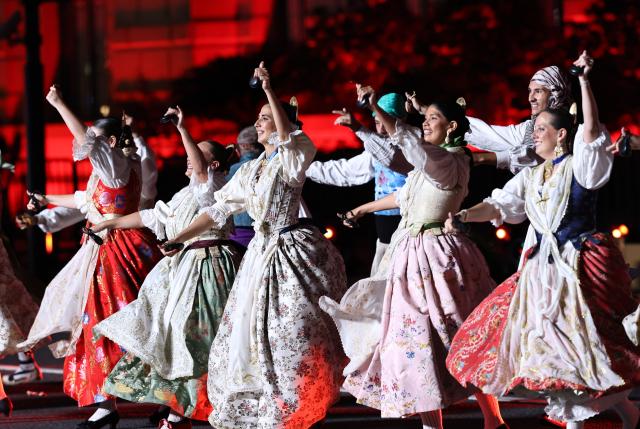(260913) -- SHANGHAI, Sept. 13, 2026 (Xinhua) -- An art troupe from Spain performs during the parade of the Shanghai Tourism Festival in Shanghai, east China, Sept. 12, 2026. The 37th Shanghai Tourism Festival parade was launched at the Bund in Shanghai on Saturday. A total of 21 floats and 21 performing teams took part in the parade. (Xinhua/Fang Zhe)
