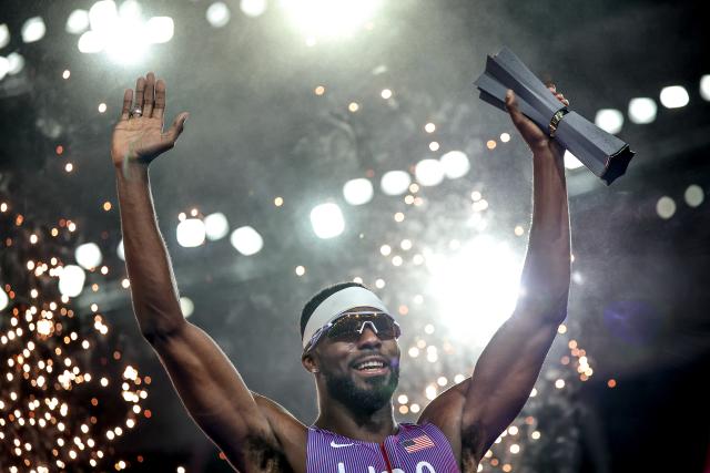 (260913) -- BUDAPEST, Sept. 13, 2026 (Xinhua) -- Kenneth Bednarek of the United States celebrates during the awarding ceremony of the men's 100 meters race at the World Athletics Ultimate Championship in Budapest, Hungary, Sept. 12, 2026. (Photo by David Balogh/Xinhua)