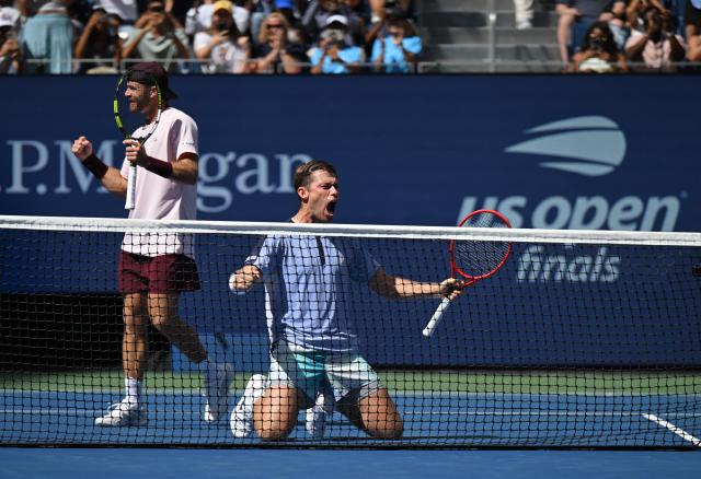 (260913) -- NEW YORK, Sept. 13, 2026 (Xinhua) -- Christian Harrison (L)/Neal Skupski celebrate after winning the men's doubles final match between Christian Harrison (the United States)/Neal Skupski (Britain) and Kevin Krawietz/Tim Puetz of Germany at the 2026 US Open tennis championships in New York, the United States, Sept. 12, 2026. (Xinhua/Li Rui)