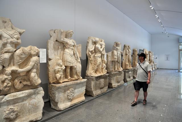 (260913) -- AYDIN, Sept. 13, 2026 (Xinhua) -- A man looks at exhibits at Aphrodisias Museum in Karacasu district of Aydin province, Türkiye, Sept. 12, 2026. The Aphrodisias was founded in the 4th century BC and was inscribed on the UNESCO World Heritage List in 2017. (Mustafa Kaya/Handout via Xinhua)