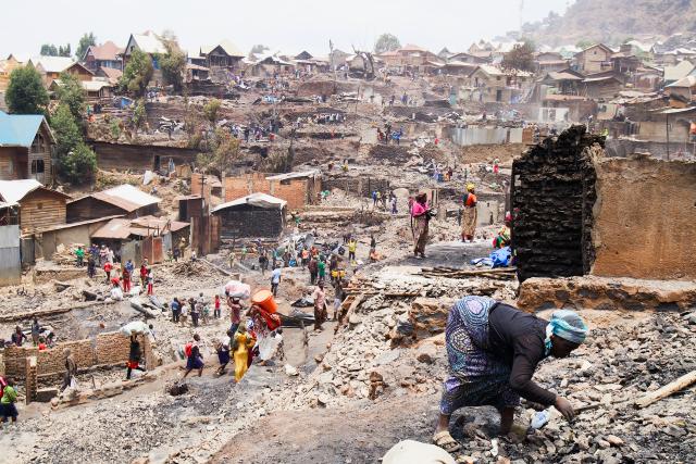 (260913) -- BEIJING, Sept. 13, 2026 (Xinhua) -- People inspect a fire site in Bukavu, Democratic Republic of the Congo, Sept. 11, 2026. The death toll from a fire that broke out Thursday in Bukavu, the capital of South Kivu Province in the eastern Democratic Republic of the Congo (DRC), has risen to 29, all of them students, according to a report released by local authorities late Thursday. (Photo by Alain Uaykan/Xinhua)