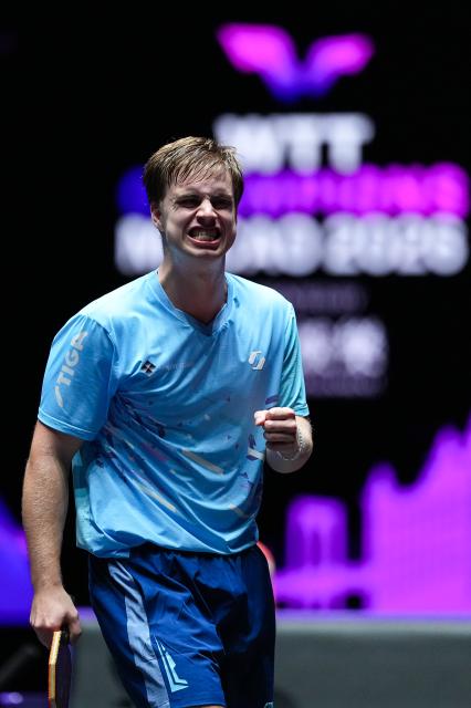 (260913) -- MACAO, Sept. 13, 2026 (Xinhua) -- Truls Moregard celebrates scoring during the men's singles semifinal match between Truls Moregard of Sweden and Harimoto Tomokazu of Japan at the 2026 World Table Tennis (WTT) Champions Macao in Macao, south China, Sept. 13, 2026. (Xinhua/Cheong Kam Ka)