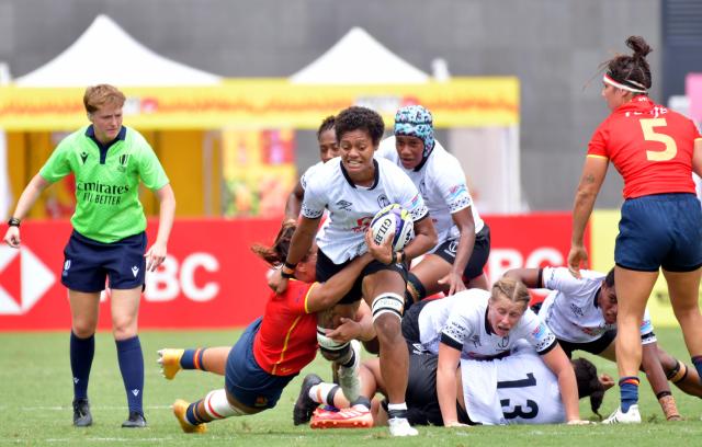 (260913) -- HONG KONG, Sept. 13, 2026 (Xinhua) -- Alfreda Fisher (front) of Fiji competes during the pool match between Spain and Fiji of WXV Global Series rugby competition in Hong Kong, south China, Sept. 13, 2026. (Xinhua/Lo Ping Fai)