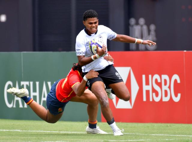 (260913) -- HONG KONG, Sept. 13, 2026 (Xinhua) -- Aqela Raitubu (R) of Fiji competes during the pool match between Spain and Fiji of WXV Global Series rugby competition in Hong Kong, south China, Sept. 13, 2026. (Xinhua/Lo Ping Fai)