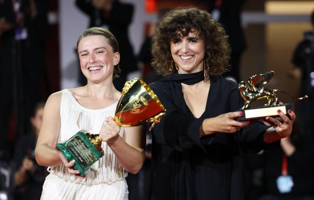 (260913) -- VENICE, Sept. 13, 2026 (Xinhua) -- Danish director May el-Toukhy (R) of the film Woman Unknown, also the winner of the Golden Lion for Best Film, and Mathilde Arcel, winner of the Best Actress for Woman Unknown, pose together with their trophies at the 83rd Venice International Film Festival in Venice, Italy, Sept. 12, 2026. The 83rd Venice International Film Festival closed on Saturday on Venice's Lido. (Xinhua/Wang Kaiyan)