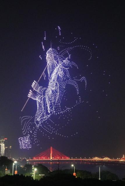 (260913) -- NANCHANG, Sept. 13, 2026 (Xinhua) -- A drone show is staged over a square along Ganjiang River in Nanchang, east China's Jiangxi Province, Sept. 12, 2026. (Xinhua/Zhou Mi)