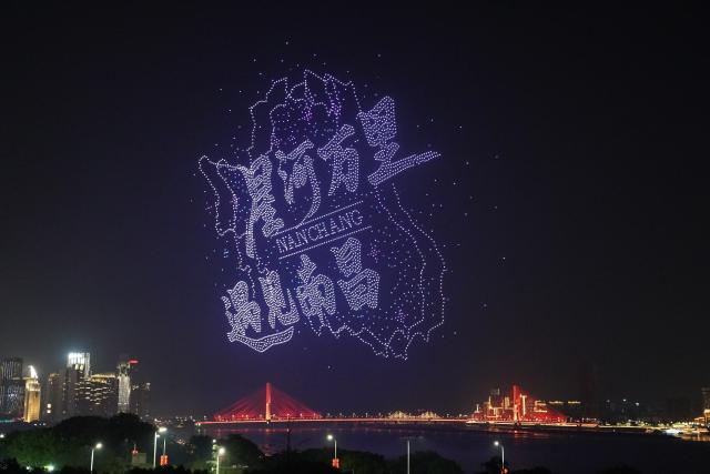 (260913) -- NANCHANG, Sept. 13, 2026 (Xinhua) -- A drone show is staged over a square along Ganjiang River in Nanchang, east China's Jiangxi Province, Sept. 12, 2026. (Xinhua/Zhou Mi)