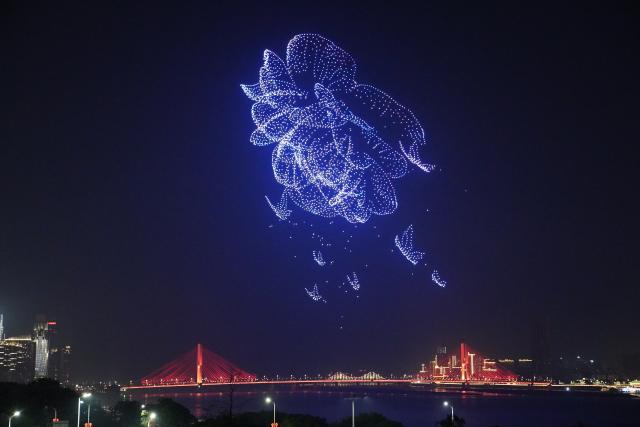 (260913) -- NANCHANG, Sept. 13, 2026 (Xinhua) -- A drone show is staged over a square along Ganjiang River in Nanchang, east China's Jiangxi Province, Sept. 12, 2026. (Xinhua/Zhou Mi)