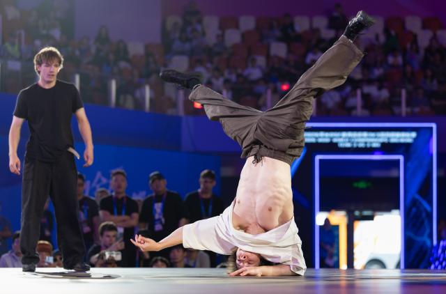 (260913) -- CHENGDU, Sept. 13, 2026 (Xinhua) -- Mashchenko lllia (R) of Team Ukraine 1 competes during the 3on3 Final at the 2026 WDSF World Championships Breaking Youth and 3vs3 Mix in Chengdu, southwest China's Sichuan Province, Sept. 13, 2026. (Xinhua/Jiang Hongjing)