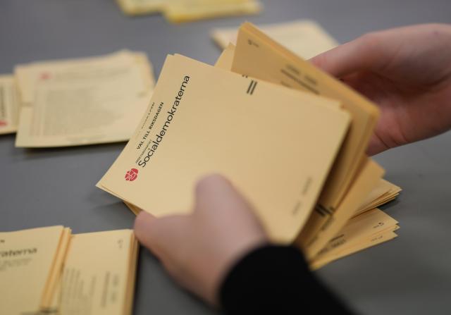 (260914) -- STOCKHOLM, Sept. 14, 2026 (Xinhua) -- A staff member works at a counting station in Stockholm, Sweden, Sept. 13, 2026. Polling stations opened across Sweden on Sunday morning in a closely watched parliamentary election that could see the far-right Sweden Democrats (SD) enter government for the first time or the center-left return to power after four years in opposition.
   The opposition bloc held a lead over the right-wing bloc in two exit polls released after voting ended in Sunday's parliamentary election.
   Public broadcaster SVT's exit poll put the four opposition parties at 51.3 percent of the vote, against 46.8 percent for the four right-wing parties. A separate election-day survey by TV4 showed a similar picture, giving the opposition 51.3 percent and the right 47.0 percent. (Xinhua/Weng Xinyang)